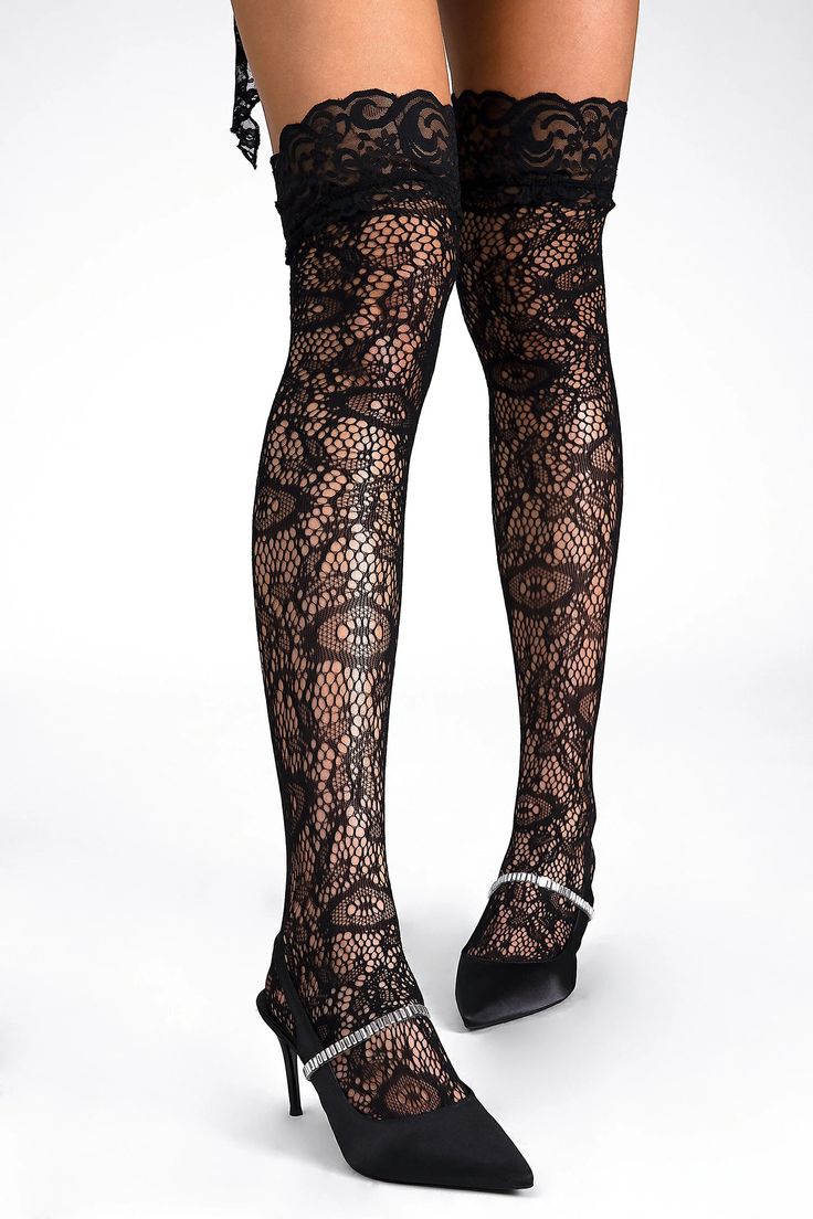 Introducing the Raniyah Lace Thigh Socks, a captivating blend of elegance and allure. These exquisite thigh-high socks feature intricate lace detailing, creating a timeless and sophisticated look that exudes confidence and style. Thigh High Lace Hosiery With Lace Trim, Tight Thigh-high Party Hosiery, Thigh High Tights With Lace Trim, Thigh-high Tights With Lace Trim, Stretch Lace Tights For Night Out, Elegant Stretch Stockings With Lace Trim, Elegant Stretch Lace Trim Hosiery, Stretch Lace Stockings With Lace Trim, Elegant Thigh High Legwear For Party