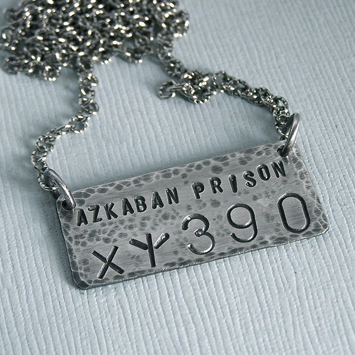 a necklace with a name tag attached to it