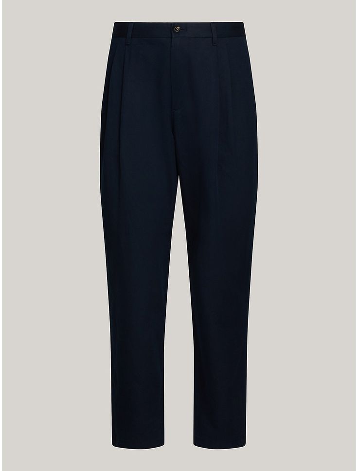 Tommy Hilfiger men's pant. Cut from a linen and cotton blend in a sleek, straight-leg silhouette, these chinos effortlessly add casual style to your wardrobe.  Material: 58% Linen, 42% Better Cotton Initiative. Linen Chinos With Tapered Leg For Business Casual, Business Casual Linen Chinos With Tapered Leg, Classic Tommy Hilfiger Tapered Leg Bottoms, Classic Linen Chinos With Straight Hem, Tommy Hilfiger Straight Leg Pants With Welt Pockets, Tommy Hilfiger Tapered Leg Bottoms With Pockets, Tommy Hilfiger Tapered Leg Pants With Pockets, Tommy Hilfiger Classic Tapered Leg Pants, Modern Chinos With Welt Pockets