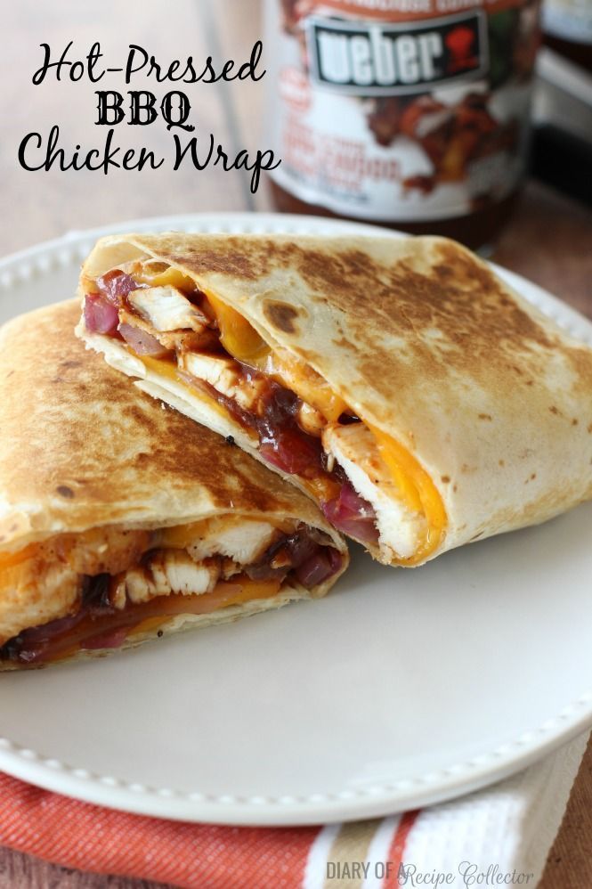 a quesadilla cut in half on a white plate next to a jar of bbq chicken wraps