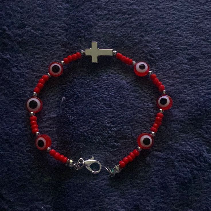 Brand New Super Cute Red With Silver Trimmings And Cross Evil Eye Bracelet With No Stretch. Fits Most! I’m 5”4 Weight 162 (Just So You Can Get An Idea On The Fit). Any Questions Please Ask Before Purchasing Thank You Evil Eye Bracelet Red, Evil Eye Beaded Bracelet, Eye Bracelet, Evil Eye Bracelet, Evil Eye, Beaded Bracelet, Super Cute, Beaded Bracelets, Women Accessories