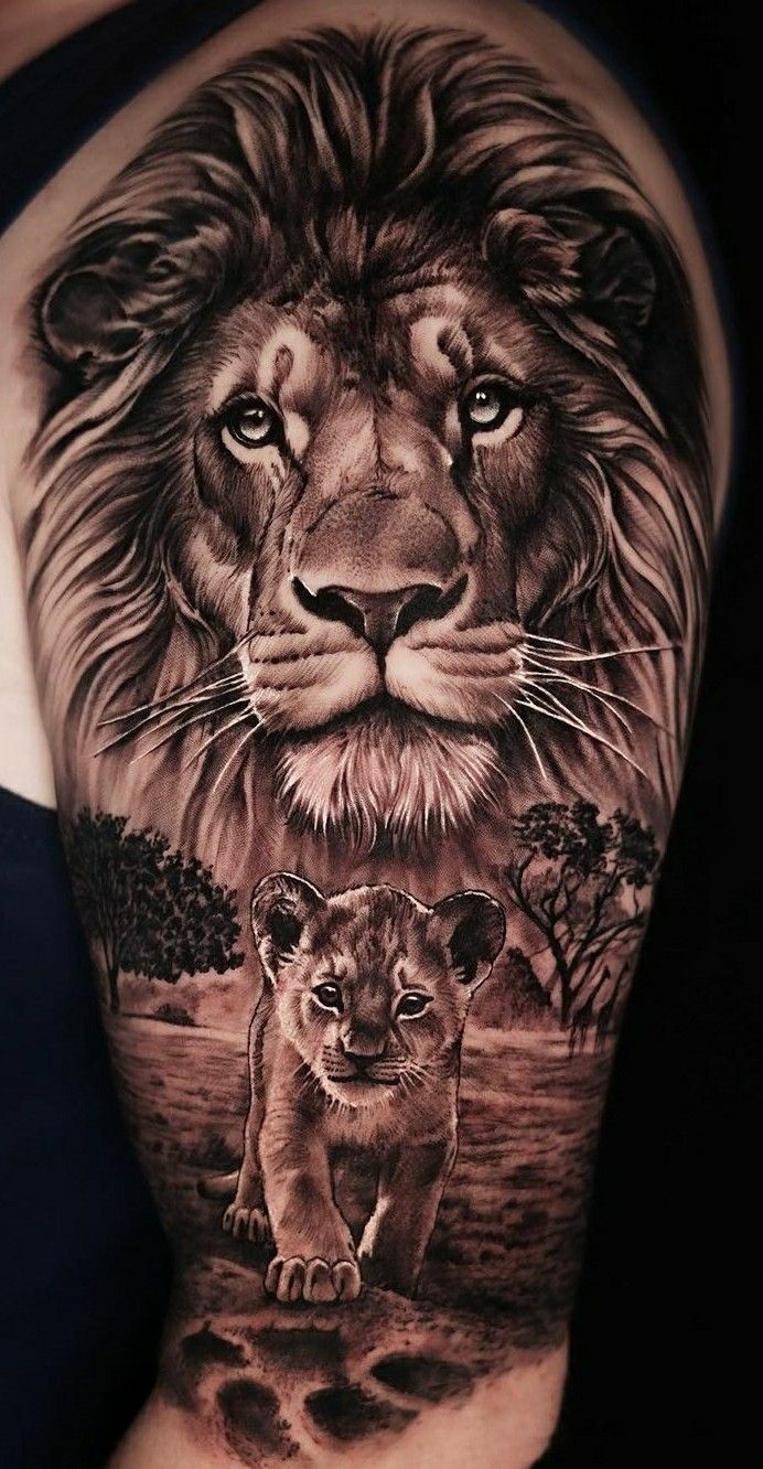 a woman's arm with a lion and cub tattoo on the left side of her body