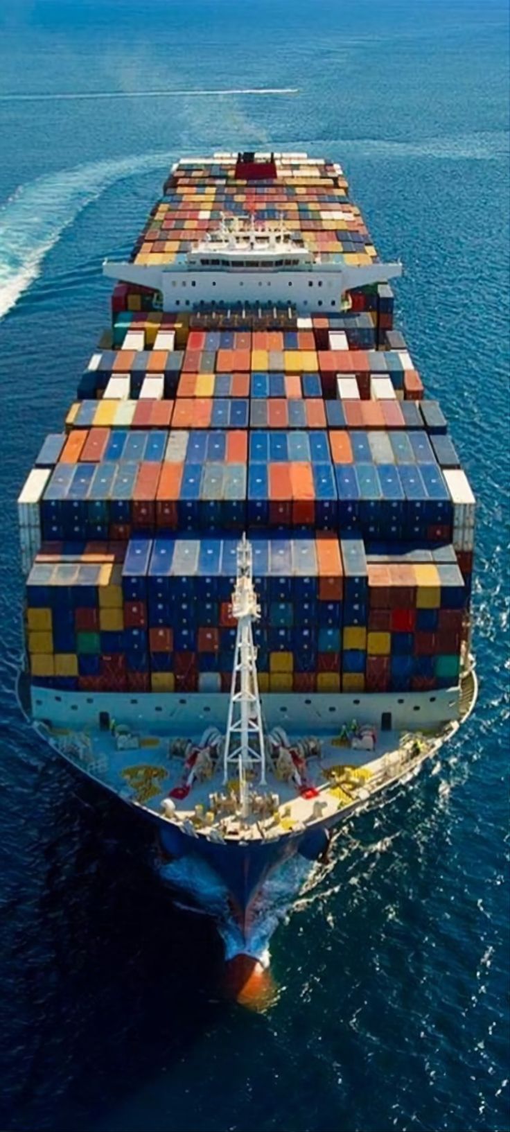 a large container ship in the middle of the ocean