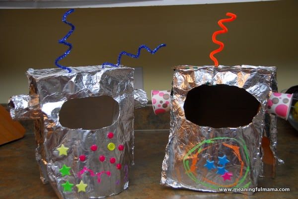 two tin foil bags with stars and confetti on them, one has a hole in it