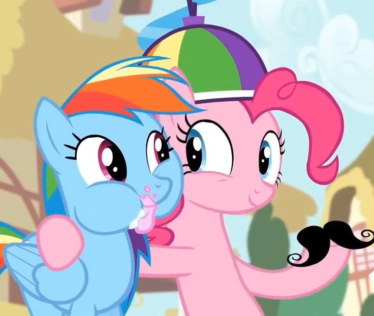 pinkie and rainbow hugging each other in front of trees