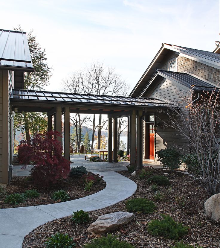 a house that has a walkway in front of it