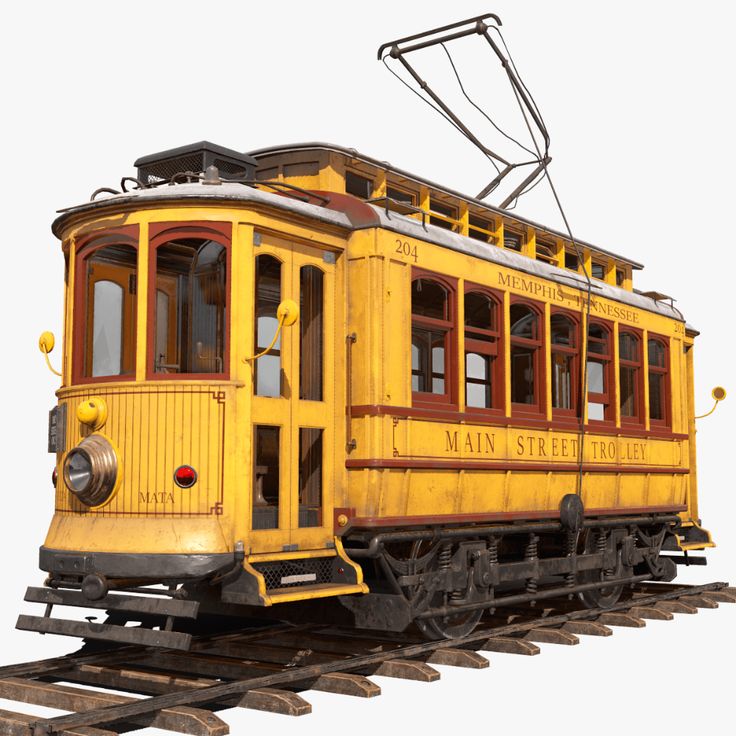 an old yellow train car sitting on the tracks