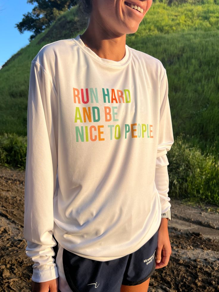 The Run Hard Performance Long Sleeve is the perfect addition to your running collection. Built for the mild springtime temperature, this sweatshirt will keep you cozy during all of your activities. Color: White Fabric: 100% Moisture-wicking Polyester Fit: Unisex Fit Running Long Sleeve, Athleisure Letter Print Tops For Outdoor, Outdoor Sportswear Tops With Letter Print, Outdoor Crew Neck Sweatshirt In Athleisure Style, Casual Moisture-wicking Sweatshirt For Sports, Casual Moisture-wicking Sports Sweatshirt, Sporty Tops With Letter Print For Outdoor, Athleisure Activewear With Graphic Print For Outdoor Activities, Athleisure Activewear With Graphic Print For Outdoor