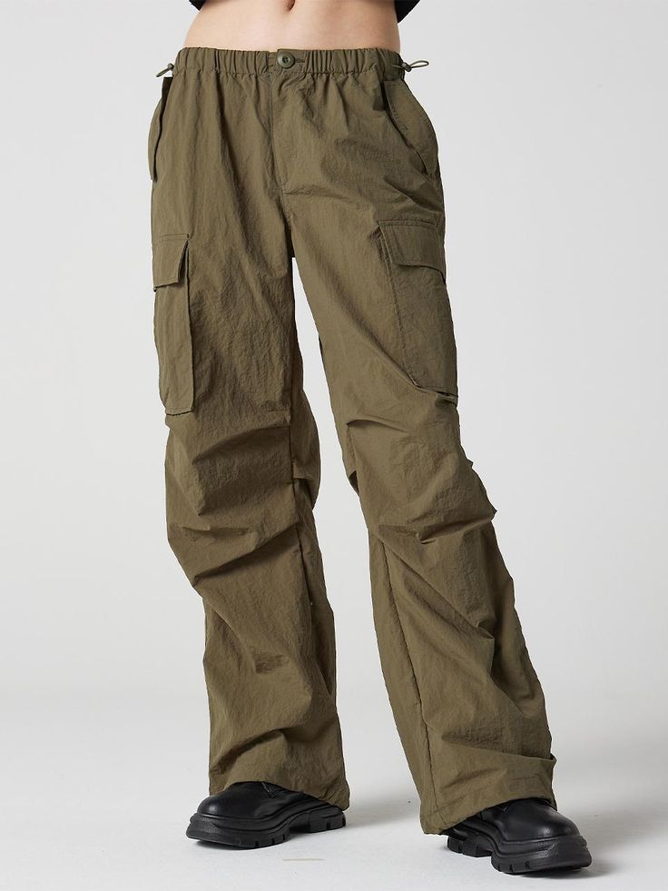 Composition : nylon 100%Color : Khaki Country of Origin : Vietnam Baggy Khaki Parachute Cargo Pants, Baggy Khaki Cargo Parachute Pants, Utility Nylon Cargo Pants, Outdoor Baggy Cargo Parachute Pants, Military Nylon Outdoor Pants, Baggy Cargo Style Parachute Pants For Outdoor, Baggy Parachute Pants For Outdoor, Khaki Techwear Parachute Pants With Cargo Pockets, Nylon Cargo Style Parachute Pants