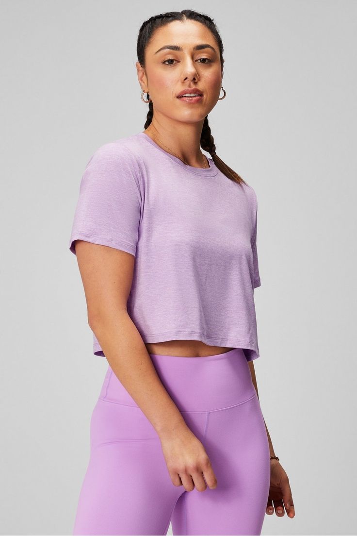 Dry-Flex Cropped Short-Sleeve Tee Fabletics purple female Activewear >> Womens >> Tops >> Short Sleeve T-Shirts >> Cropped regular Everyday/Training/Yoga and Studio Moisture-Wicking Made from recycled fabric! Purple Sporty Workout T-shirt, Sporty Purple Workout T-shirt, Purple Crew Neck T-shirt For Workout, Purple Go-dry Athleisure Top, Purple Short Sleeve Activewear For Workout, Cotton Short Sleeve Top For Light Exercise, Sporty Stretch Purple T-shirt, Sporty Heather Tops For Sports, Purple Sporty Top For Summer