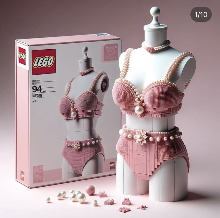 a mannequin made out of legos with pearls on it's chest