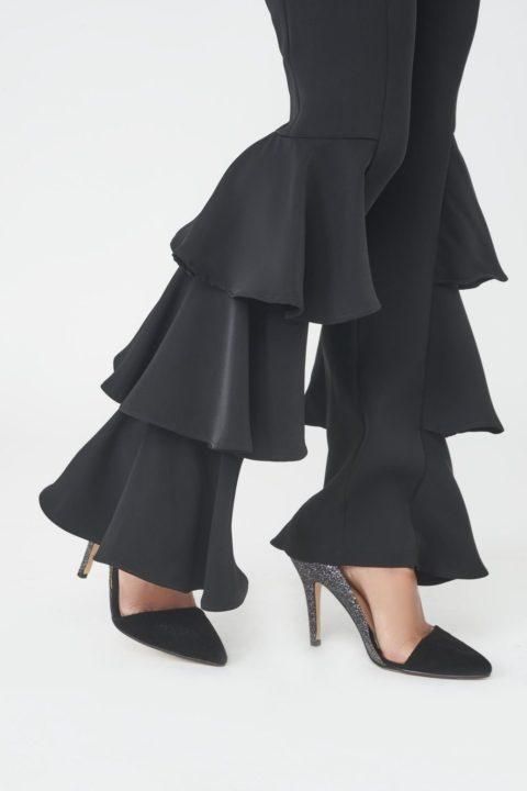 The style of trousers to be sporting this season, these frill side tailored beauties will bring a playful update to your basic work and evening wardrobes. Great for the office with some pointed heels, or straight to meet your girls for a night out with some striking stilettos. We’re calling these an investment item – not to be missed. Frill Side Tailored Trousers Polyester Hand wash Imported Brand: Lavish Alice Fitted Evening Pants With Ruffles, Fitted Ruffled Pants For Evening, Fitted Pants With Ruffles For Evening, Chic Ruffled Bottoms For Formal Occasions, Chic Formal Bottoms With Ruffles, Glamorous Black Flare Bottoms, Ruffled Wide Leg Pants For Evening, Evening Wide Leg Ruffled Pants, Black Flare Dress Pants For Evening