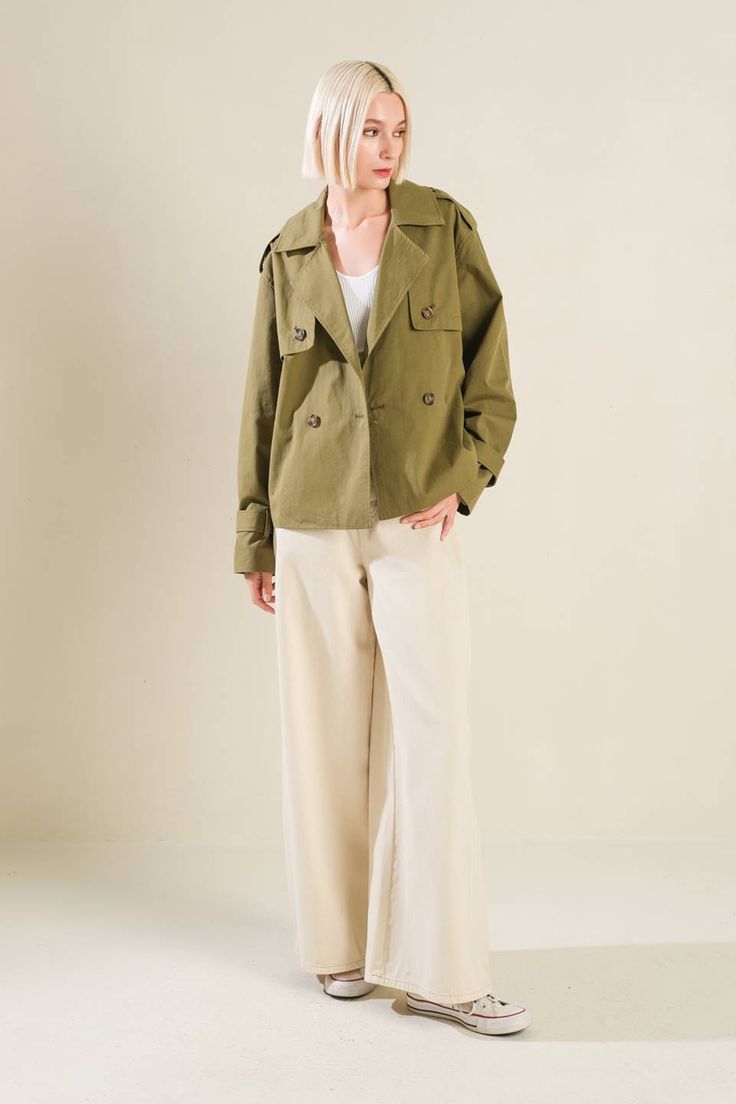 A solid woven jacket. Matching pant FP1315 Details: Self : 100% CottonLining : 100% Cotton Size & Fit - Model is 5`8" And Wearing Size Small- Measurements Taken From Size Small- Approx. Length: 26" Oversized Khaki Blazer For Workwear, Fall Cotton Khaki Blazer, Collared Khaki Outerwear For Work, Military Style Single Breasted Outerwear For Spring, Green Relaxed Fit Utility Jacket For Fall, Military Style Outerwear For Spring, Military Style Spring Workwear Outerwear, Khaki Single Breasted Relaxed Fit Outerwear, Military Style Outerwear For Spring Workwear