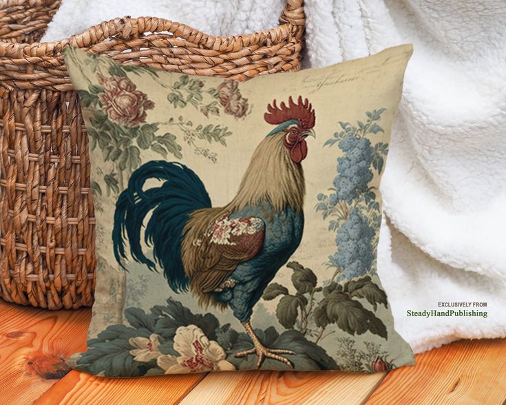 a rooster pillow sitting on top of a wooden floor next to a wicker basket