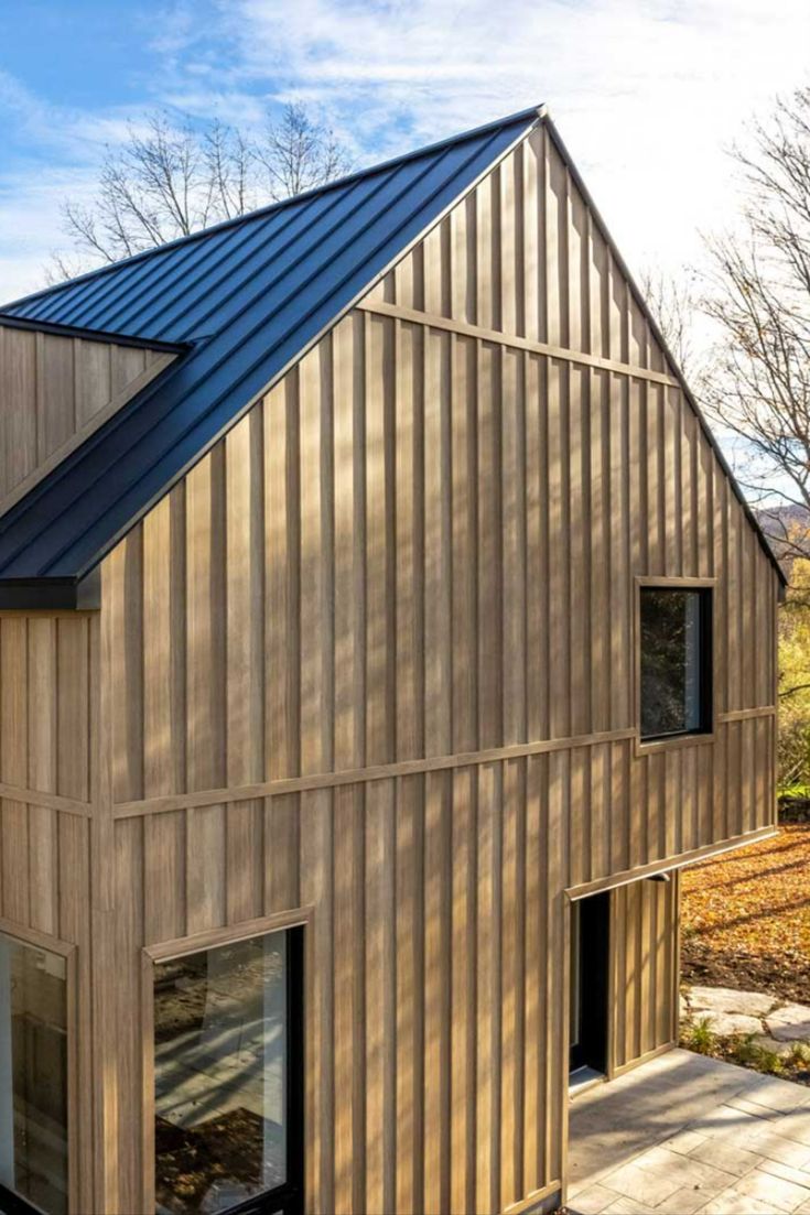 a house that is made out of wood and metal