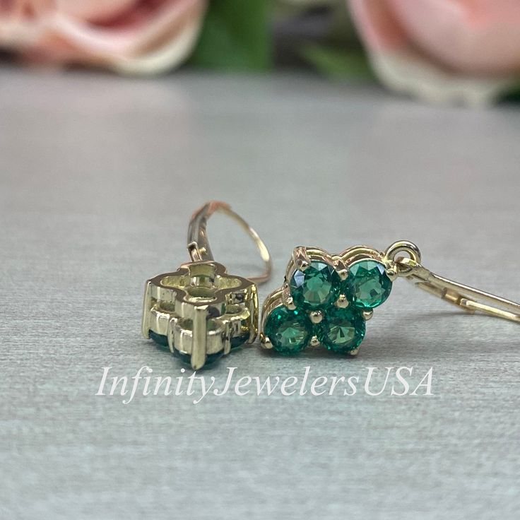 These Lever Back earrings are a lab created round emeralds, made with pure 14k yellow gold, #6873 Would make a perfect gift for a May Birthday, Mothers Pendant, a graduation, anniversary, bridal gift or just a gift for her. Other color gems are available, inquire for pricing. - 1.00 ct each -Approximate total carat weight: 2.00 ct -Gem Type: Lab created emerald -Stone Shape: 8 Round / 4MM -Stone Color: Lively rich green -Stone Clarity: VS2 -Hardness: 8.5 -Metal Type and Purity: 14k yellow gold C Formal Emerald Earrings With Prong Setting, Classic Emerald Dangle Jewelry, Classic Emerald Earrings For Anniversary, Emerald Round Cut Earrings For Anniversary, Round Cut Emerald Earrings For Anniversary, Classic Gemstone Earrings For May Birthstone, Fine Jewelry With May Birthstone In Cluster Shape, Fine Jewelry Cluster May Birthstone, Fine Jewelry May Birthstone Cluster