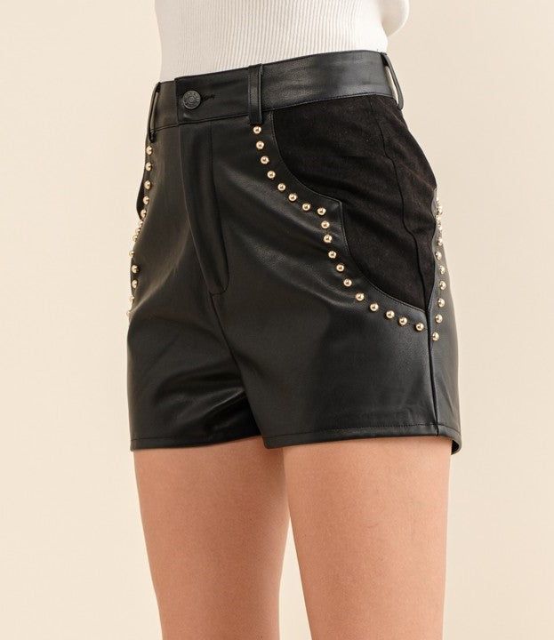 Expertly crafted using the finest materials, these faux suede & leather shorts are guaranteed to provide unbeatable softness. Perfect for a night out with the girls or a trip to Nashville, these shorts are also a great choice to level up your country western concert outfit. With stylish stud accents, you'll be sure to make a statement wherever you go. 50% PU/50% Polyester Faux Leather Bottoms With Built-in Shorts For Night Out, Fitted Leather Shorts For Party, Fall High-waisted Faux Leather Shorts, Fall Faux Leather High-waisted Shorts, Faux Leather Shorts For Fall, Fitted Faux Leather Shorts For Night Out, Fall Faux Leather Shorts, Faux Leather Shorts For Night Out And Fall, Faux Leather Shorts For Night Out In Fall