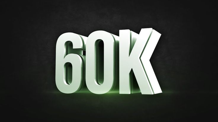 the word 60k is lit up in white letters on a black background with green light