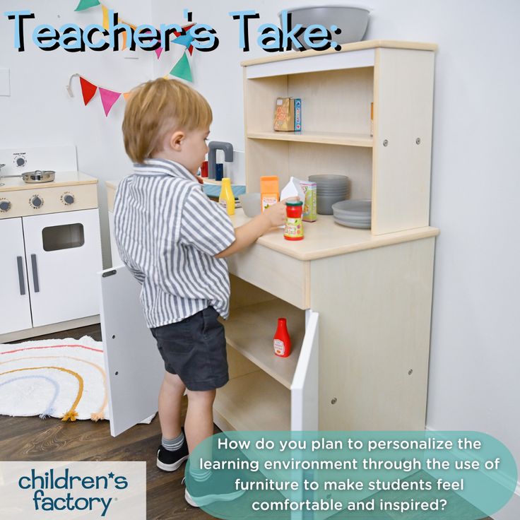 a young boy playing with toys in a play kitchen and learning to learn how to use it