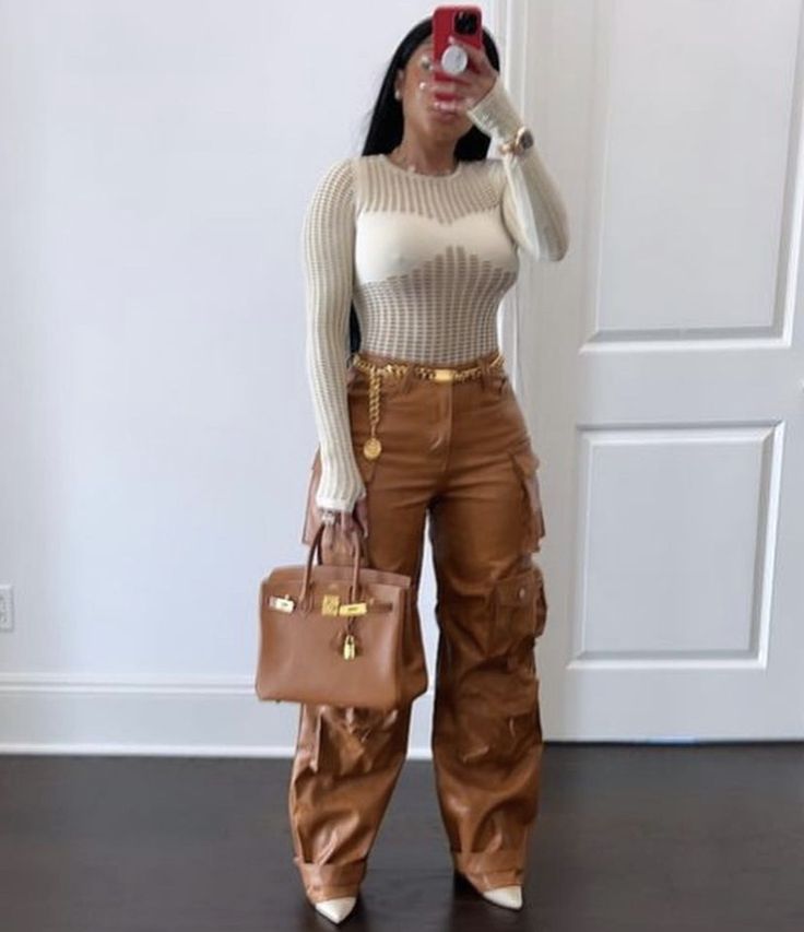 Baddie Jeans Outfit Winter, Dress Pants Outfits Black Women, Cargo Pants Outfit Winter Baddie, Brown And Cream Outfits For Black Women, Leather Pants With Sneakers Outfits, Brown Cargo Pants Outfit Black Women, Dressy Cargo Pants Outfit Women, Tan Cargo Pants Outfit Winter, Brown Brunch Outfit Black Woman