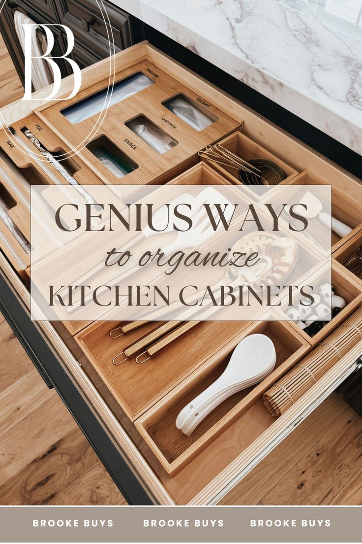 an open drawer with utensils and spoons in it