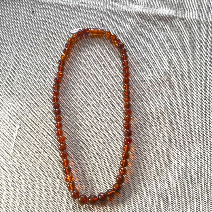 100% Authentic 20 Inch Amber Beaded Necklace.. This Still Has The Tags On It. I Have Never Worn It. It’s In Pristine Condition. Each Bead Is 7 Mm. Tory Burch Necklace, Red Crystal Necklace, Coin Pearl Necklace, Amber Bead Necklace, Feminine Necklace, Tanzanite Pendant, Bride Necklace, Beaded Tassel Necklace, Layered Necklaces Silver