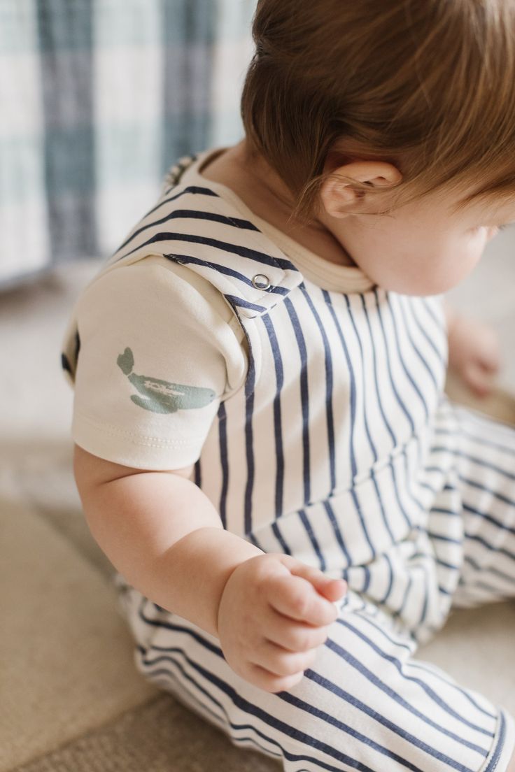 Sweet stripes and fun prints set the perfect summer mood! Made with certified organic cotton, our Overalls are designed to fit in all the right places and still give your little ones all the space they need to wiggle and move. Organic Cotton & Dyes Playful Short Sleeve Onesie, Fitted Organic Cotton Onesie For Playtime, Organic Cotton Short Sleeve Onesie For Playwear, Organic Cotton Playwear Onesie, Cute Cotton Onesie For Playtime, Playful Organic Cotton Tops For Playwear, Playful Organic Cotton Onesie For Playtime, Playful Short Sleeve Onesie For Playwear, Summer Playtime Cotton Onesie