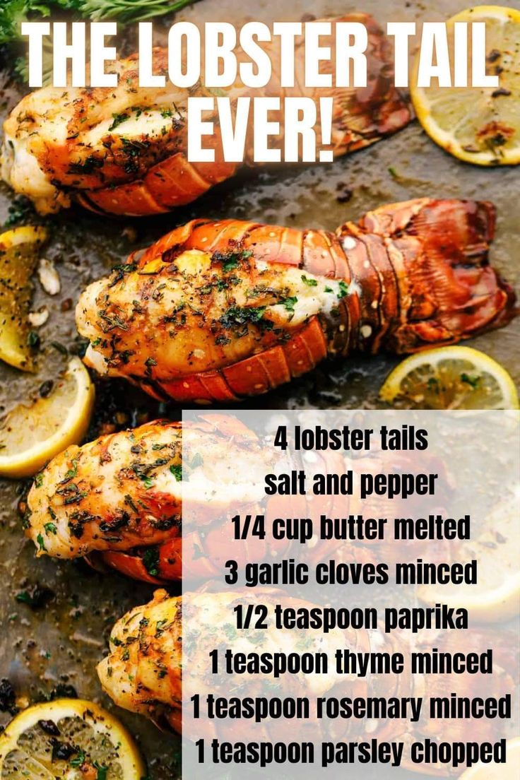 lobster tails with lemons and parsley on the side