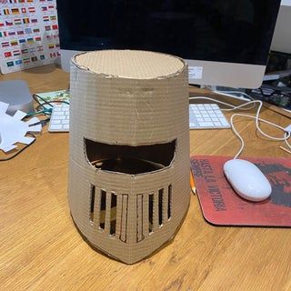 a computer tower sitting on top of a wooden desk next to a keyboard and mouse