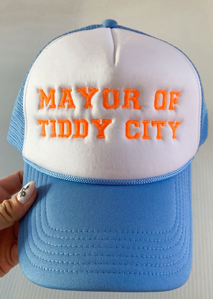 "MAYOR OF TIDDY CITY" FOAM TRUCKER EMBROIDERED HAT Photo features baby blue cap with orange thread Adjustable Hat Size Funny Trucker Hats, Funny Trucker Hat, Hat Photo, Custom Trucker Hats, Funny Hats, Embroidered Hat, Hat Ideas, Future Mrs, Embroidered Hats