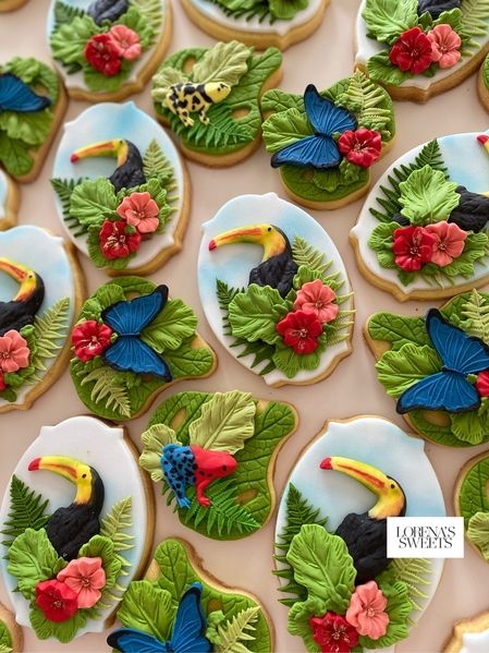 decorated cookies with birds, leaves and flowers