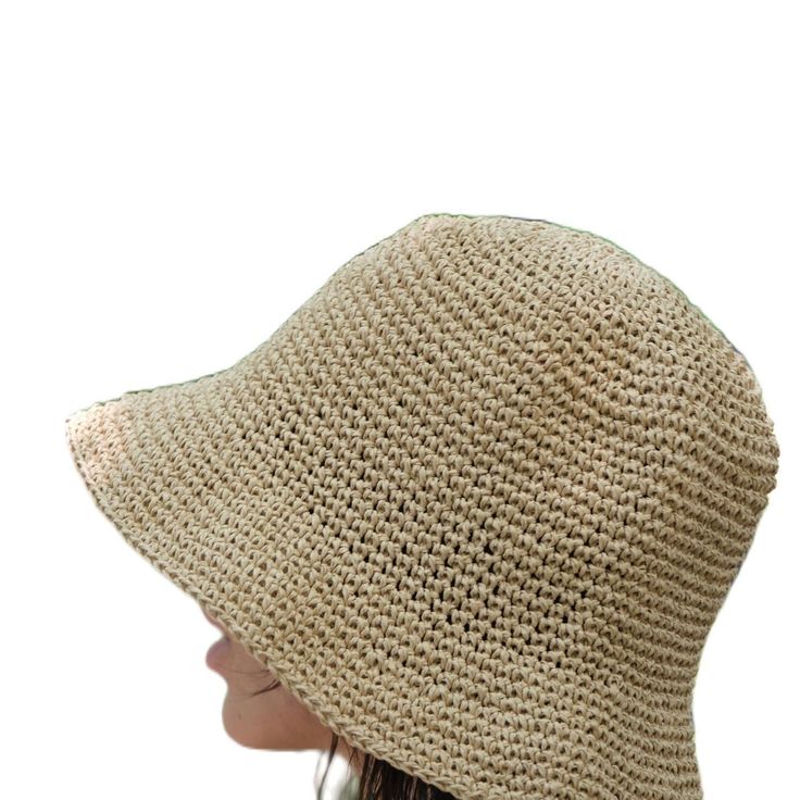 This hat is 100% handmade and crafted from raffia yarn. Raffia yarn is a natural and durable material, ensuring the hat's longevity. The wide brim of the hat is perfect for sun protection and offers a stylish look. This beige hat stands out with its simple and elegant design. It is an excellent accessory for both everyday use and outdoor activities like the beach. Its comfortable and lightweight structure ensures easy and prolonged wear. Raffia. You can store this hat, knitted from raffia rope, in a breathable cloth bag, protect it from fire and heat, and wipe the stains with a clean damp cloth. Yarn Sun Hat With Curved Brim, Natural Crochet Hat With Curved Brim, Natural Curved Brim Crochet Hat, Natural Woven Wide Brim Bucket Hat, Wide Brim Natural Woven Bucket Hat, Wide Brim Woven Bucket Hat In Natural, Natural Wide Brim Toquilla Straw Bucket Hat, Brimmed Woven Toquilla Straw Bucket Hat, Woven Toquilla Straw Bucket Hat With Curved Brim