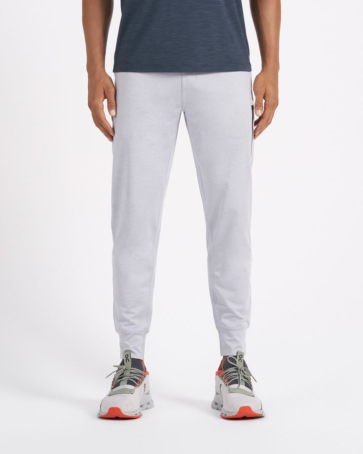 A fresh take on athleisure and a staple in your wardrobe, the Sunday Performance Joggers are premier in fit, function and soft stretch. This jogger style will keep you moving with less bulk around your ankles. | Vuori Sunday Performance Jogger Pants | Platinum Heather | XXL Vuori makes premium performance apparel inspired by the active Coastal California lifestyle; an integration of fitness, surf, sport, and art. Breaking down the boundaries of traditional activewear, we are a new perspective on 4-way Stretch Sportswear Joggers With Side Pockets, Sportswear Bottoms With 4-way Stretch, Sportswear Bottoms With Go-dry Technology, Functional Activewear With Pockets For Loungewear, Sporty Recycled Polyester Bottoms With Relaxed Fit, Athleisure Go-dry Long Bottoms, Athleisure Go-dry Long Pants, Sporty Relaxed Fit Bottoms In Recycled Polyester, Go-dry Athleisure Bottoms Long Pants