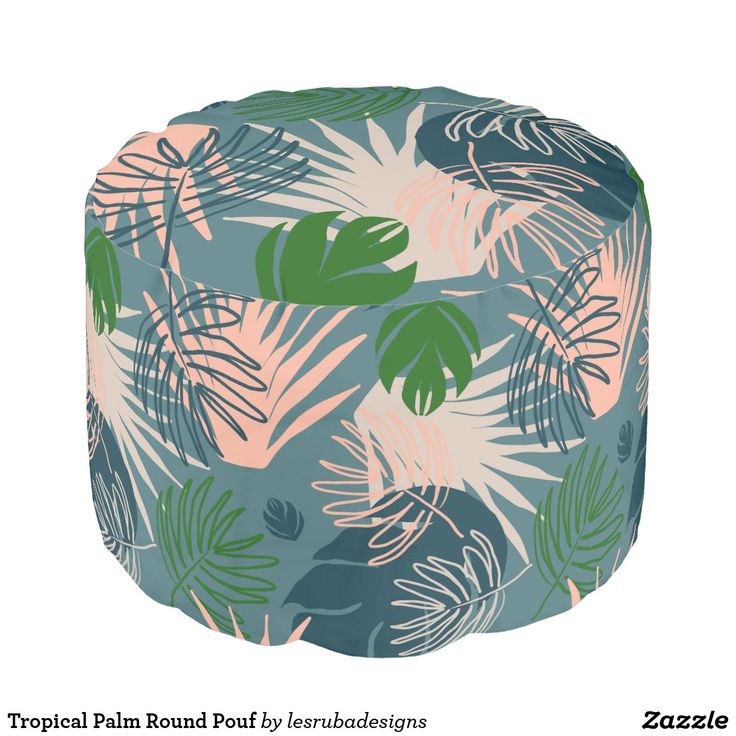 a tropical print poufle with palm leaves on it