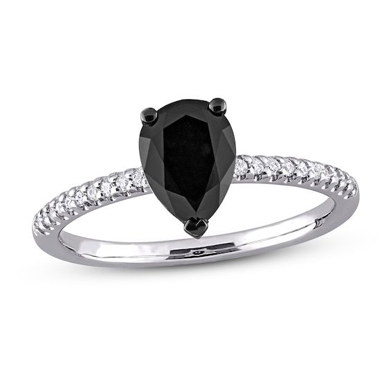 a black and white diamond ring on a white background