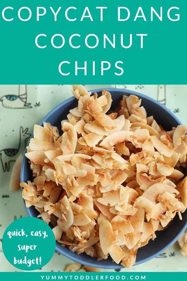 a blue bowl filled with coconut chips on top of a table