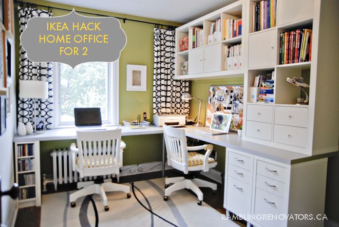 a home office with two white chairs in front of a desk and bookshelf