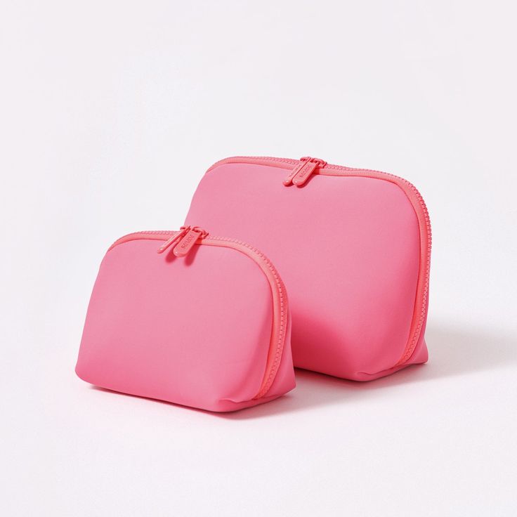 This pouch set is here to help you organize your daily essentials and make travel a little easier. With two compact pieces, everything will be neatly zipped up and perfectly organized. Plus, these pouches are machine washable, adding convenience to your organizational bliss. Cheap Pink Bag With Removable Pouch, Cosmetic Pouch Design, Pink Rectangular Travel Accessories For On-the-go, Pink Pouch With Zipper Pocket For On-the-go, Pink Cosmetic And Toiletry Pouch For Everyday Use, Pink Pencil Case With Removable Pouch For Travel, Pink Everyday Cosmetic And Toiletry Storage Pouch, Pink Rectangular Travel Accessories With Zipper Closure, Pink Cosmetic And Toiletry Storage Pouch