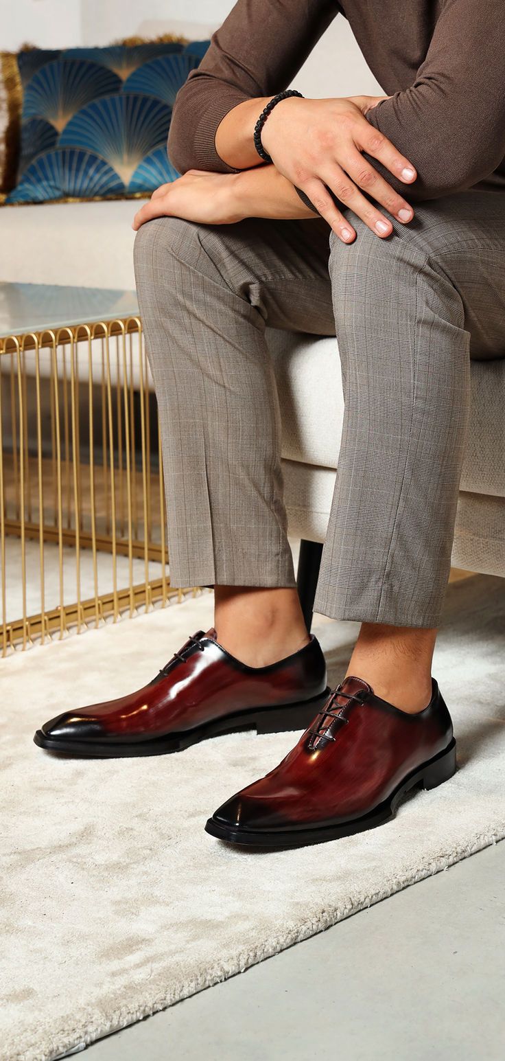 Experience unmatched elegance with our burgundy Oxford shoes. Handcrafted from premium leather, these luxurious shoes are perfect for making a statement on formal occasions. Elevate your style with timeless sophistication. Luxury Fitted Leather Lace-up Shoes, Elegant Red Lace-up Shoes With Round Toe, Red Pointed Toe Leather Shoes For Semi-formal Occasions, Formal Dress Shoes With Red Sole, Burgundy Wingtip Dress Shoes With Red Sole, Semi-formal Red Leather Shoes With Round Toe, Formal Dress Shoes With Red Sole And Round Toe, Semi-formal Burgundy Plain Toe Dress Shoes, Business Burgundy Dress Shoes With Red Sole