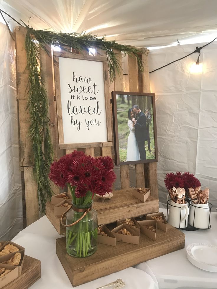 a table with flowers and pictures on it