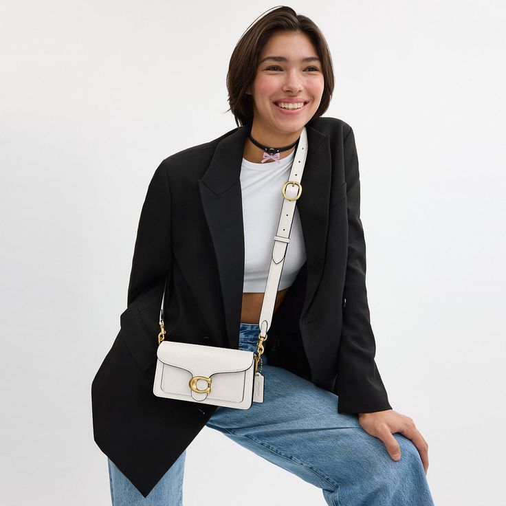 A modern take on an archival 1970s Coach design our structured Tabby shoulder bag is crafted of polished pebble leather. Smaller than the 26 the petite 20 features two detachable straps to carry by hand style as a short shoulder bag or wear crossbody. It’s finished with our Signature hardware for an iconic touch. | Coach Tabby Shoulder Bag 20 - Women's - Brass/chalk Coach Tabby Shoulder Bag, Tabby Shoulder Bag, Coach Tabby, Hand Style, Structured Bag, Polished Pebble, Large Wallet, Signature Hardware, Fjallraven Kanken