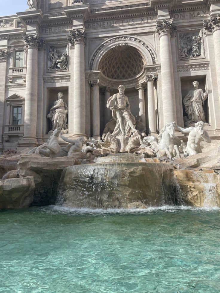 the trellotto fountain is surrounded by statues and fountains in front of an ornate building