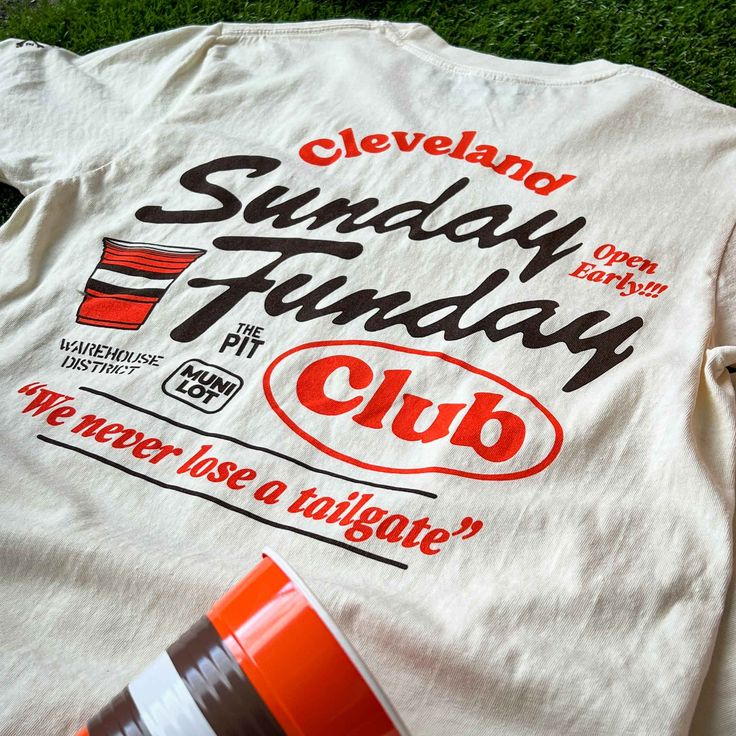 Every Sunday is a "Fun"day during Cleveland Football season! Whether your go-to tailgate spot is the Muni Lot, Warehouse District or The Pit, gear up for Game Day in this Unisex Crew T-shirt. Designed and printed right here in Cleveland on a super soft, relaxed fit, pre-shrunk, garment dyed and washed tee. 100% cotton. Note: This is a different fit from our normal tees. The tee runs shorter and has trendy boxy cut. Slight color variations may occur, given the pigment dyeing process. *This produc Fundraising Shirt Ideas Design, Cute Club Shirt Designs, Club Tshirt Designs Schools, Restaurant Tee Shirt Design, Retro Shirt Design Graphic Tees, Classic T Shirt Design, Field Day T Shirts, Hawaii Graphic Tee, Gen Z Merch