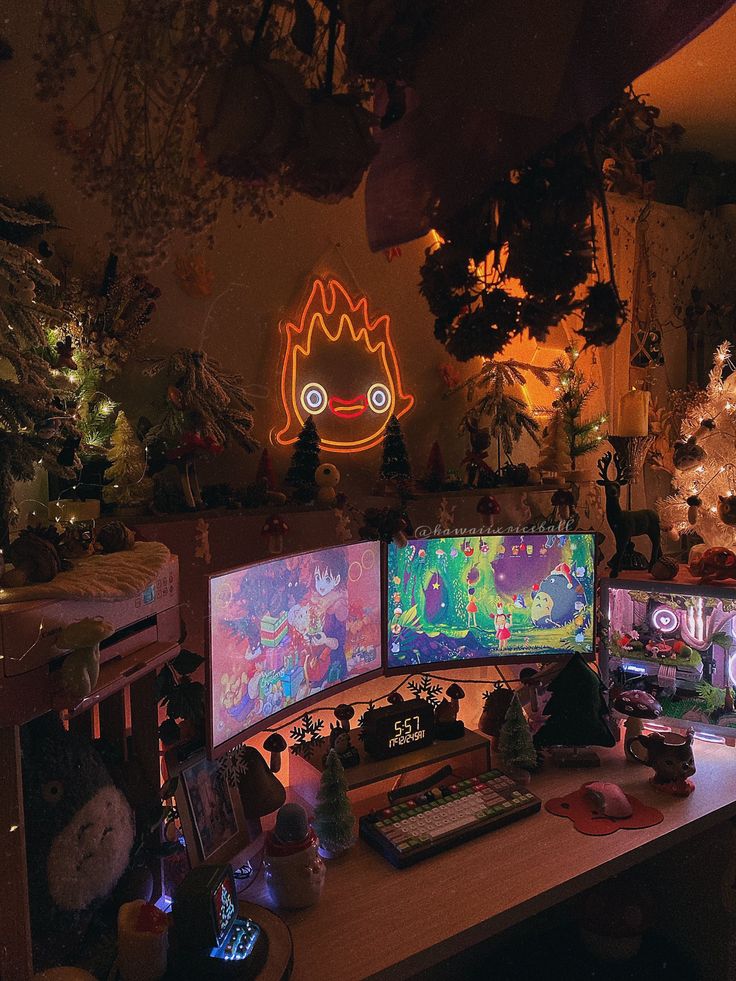 three computer monitors sitting on top of a wooden desk in front of a neon sign