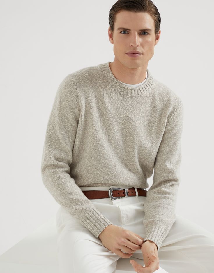 Flecked soft virgin wool and cashmere sweater The refined materials of Brunello Cucinelli knitwear enrich the essential lines of this crew-neck sweater in soft virgin wool and cashmere. The characteristic mottled effect of knop yarn enhances the feeling of softness when worn, also attributed to the garment’s regular, comfortable fit. Brunello Cucinelli Knitwear, Sweater For Man, Yarn Sweater, Cashmere Yarn, Mens Uggs, Boutique Online, Knit Crewneck, Comfortable Dress, Brunello Cucinelli