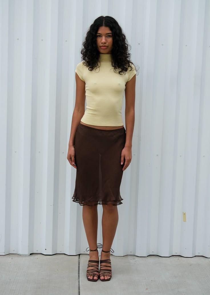 The Rosie Skirt is a sheer, double-layered, knee length silk skirt with a bias hem and elastic waist. Made in collaboration with Cierra O'day Style Inspiration Going Out, Slip Skirt And Tshirt, Cute Tops With Skirts, Cierra O'day, Mini Slip Skirt Outfit, Thrifted Skirt Outfit, Long Skirt Business Casual, Bias Skirt Outfit, Oversized Shirt And Skirt Outfit