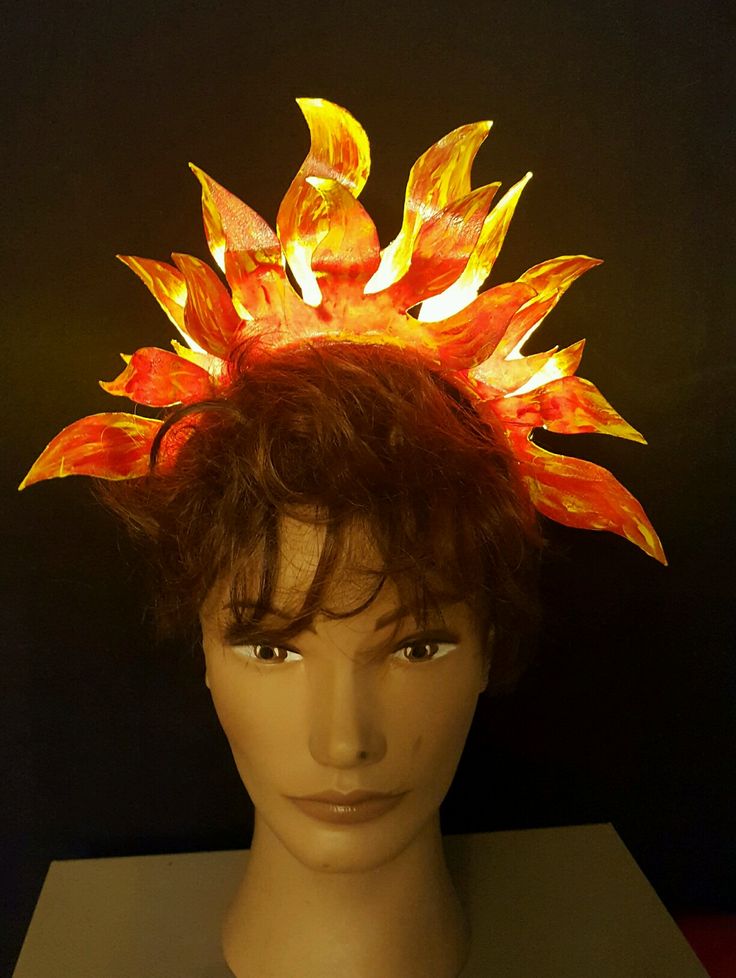 a mannequin head wearing a light up flower crown