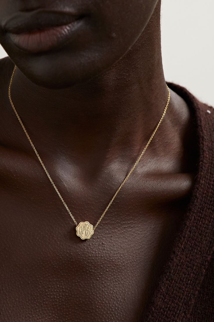 Part of the label's 'Talisman' collection, Retrouvaí's necklace has a signet-inspired pendant engraved with the phrase 'Forget Me Not' - a reminder of the wearer's individuality. It's handcrafted from 18-karat gold and has a dainty rolled chain perfect for layering with longer or shorter styles. Luxury 14k Gold Engraved Coin Necklace, Luxury Engraved 14k Gold Coin Necklace, Luxury Tarnish-resistant Medallion Necklace, Luxury 14k Gold Medallion Necklace, Luxury Coin Necklace With Adjustable Chain, Luxury Coin Necklace Perfect As A Gift, Luxury Engraved Medallion Pendant Necklace, Luxury Engraved Coin Pendant Necklace, Luxury Yellow Gold Medallion Necklace Engraved