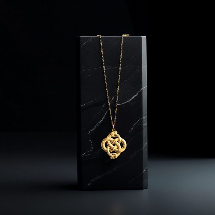 Elevate your style with our 14k Gold Ouroboros Pendant. This solid gold necklace showcases exquisite craftsmanship, symbolizing the eternal cycle of life. The 14 karat gold Ouroboros pendant is more than just jewelry; it's a fine representation of symbolism and ancient wisdom, also available in 18k yellow gold. PENDANT INFORMATIONThis pendant is made of real, solid gold.• Made in USA• Material: 14k or 18k solid gold• Finish: polished• Height: 1.15" (29,5 mm) | *includes the small circle, bail di Symbolic Yellow Gold Box Chain Necklace, Yellow Gold Medallion Locket Necklace In Amulet Style, Spiritual Yellow Gold Medallion Necklace With Large Pendant, Gold Amulet Necklace With Box Chain, Symbolic Ceremonial Necklace With Locket, Symbolic Locket Necklace For Ceremonial Use, Symbolic Ceremonial Locket Necklace, Luxury Brass Necklace With Large Pendant, Symbolic Yellow Gold Necklaces For Formal Occasions