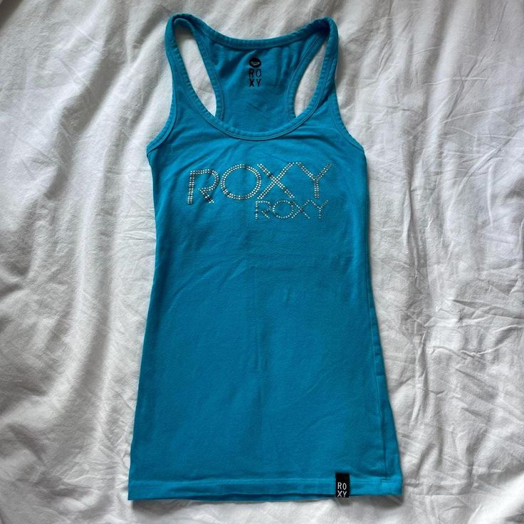 🎀Adorable blue and silver 2000s graphic tank, made of 95% cotton and 5% elastane 🎀Size women's XS, form-fitting Blue Y2k Aesthetic, 2000s Tank Top, 2000s Tops, Sublimation Ideas, Blue Y2k, 2000s Fashion Outfits, Blue Vests, Roxy Women, 2000s Fashion